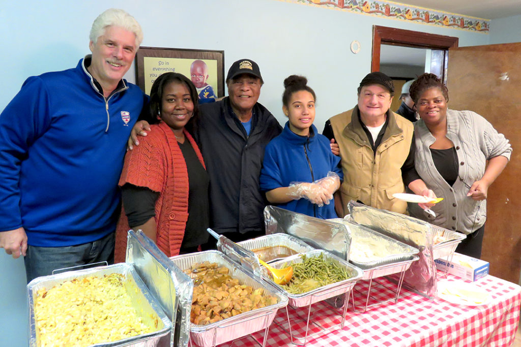 Jeff Nixon, Booker Edgerson, Lou Piccone with staff who cooked and served a great thanksgiving meal